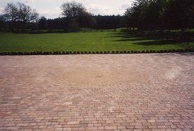 Brick patio with saltire pattern installed by Harrogate Patio and Paving